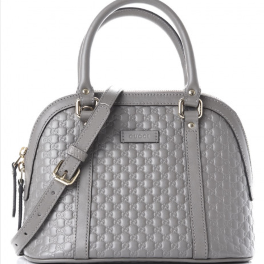 GUCCI authentic Microguccissima Mini Dome Bag